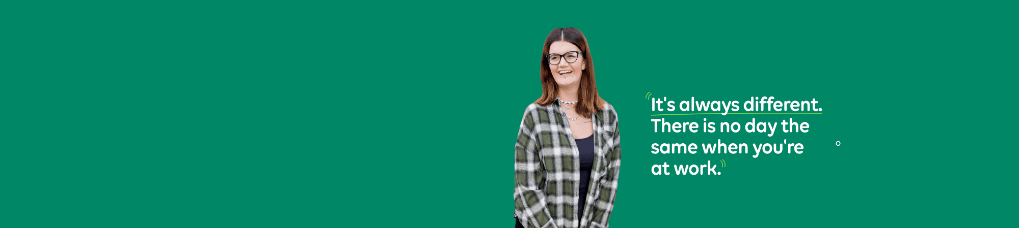 Support worker smiling with a dog